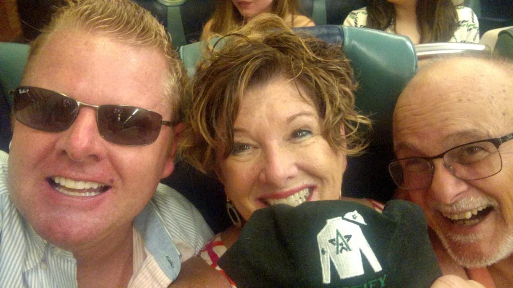Ben Roeger, Libby Ludwig, and Terry Ludwig with a Justify hat (Photo courtesy Libby Ludwig)